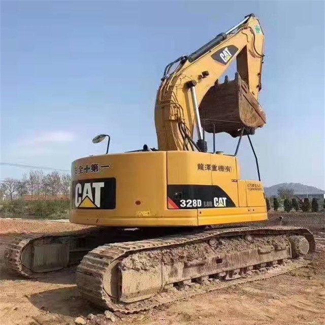 34.7 tonnellate pronte per il lavoro e giapponese Caterpillar 328 D in buone condizioni.