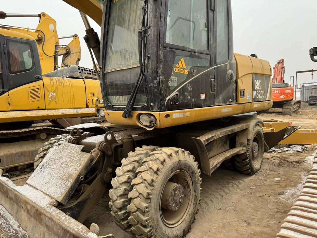 90% Caterpillar M317D2 Escavatore a ruote usato di alta qualità e migliori prestazioni in vendita