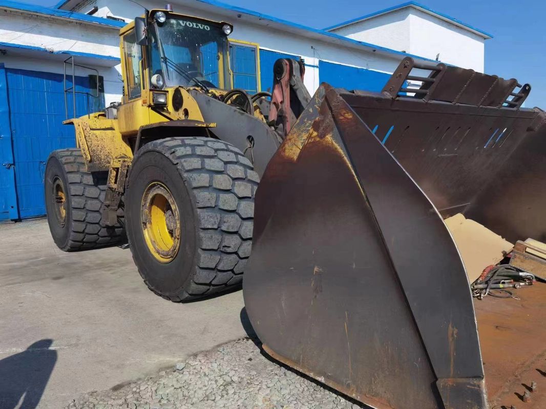 Tipo di azionamento a quattro ruote caricatore usato VOLVO L220E Disegno originale ruota Skid-Steer caricatore in movimento