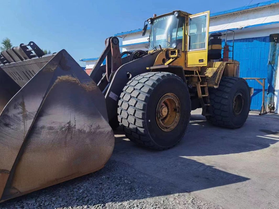 Tipo di azionamento a quattro ruote caricatore usato VOLVO L220E Disegno originale ruota Skid-Steer caricatore in movimento